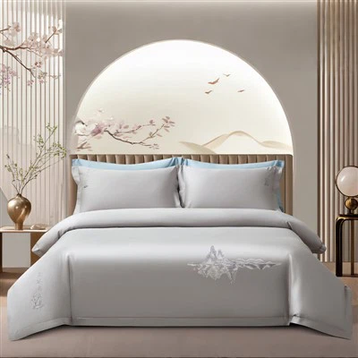 Conjunto de cama de quatro{0}} peças bordado